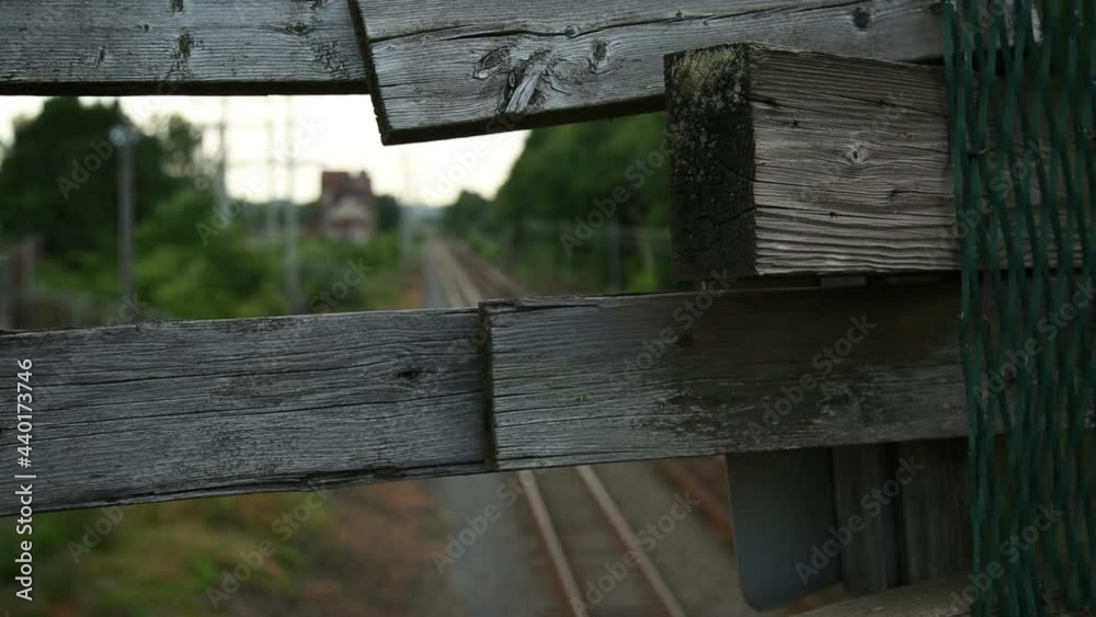 railroad to broken wood fence rack focus railroad to broken wood fence rack focus