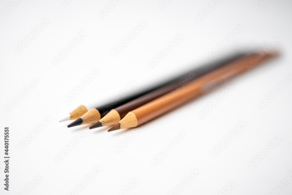 Obraz premium Colored Pencils on White Backdrop