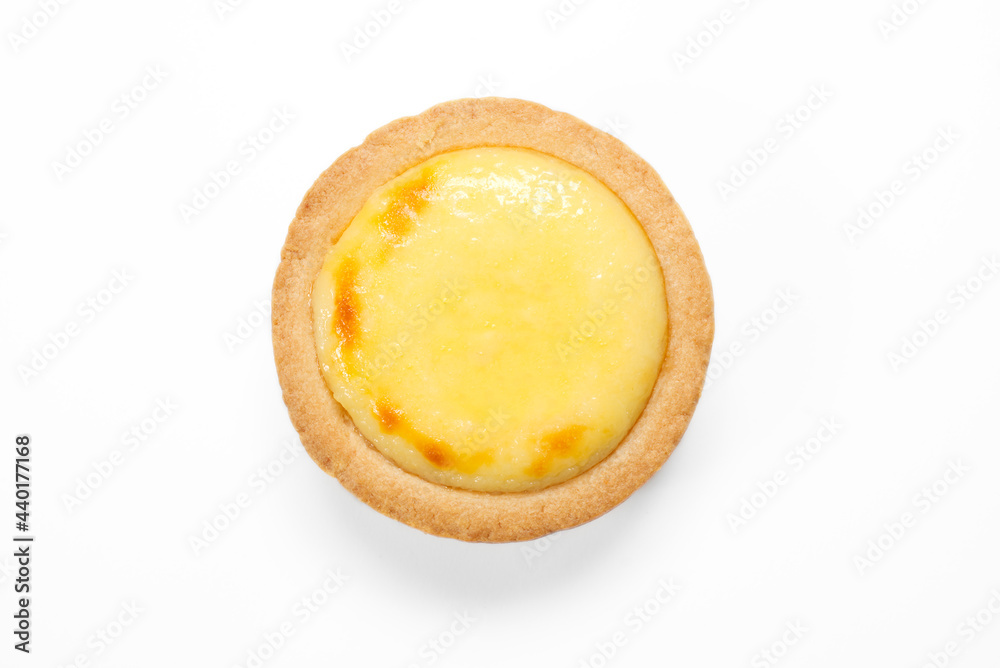 Top view closeup photo of baked cheese tart with little burning mark isolated on white background that will make you hungry. Cheese that looks glossy and delicious from studio flash light. Top view closeup photo of baked cheese tart with little burning mark isolated on white background that will make you hungry. Cheese that looks glossy and delicious from studio flash light.
