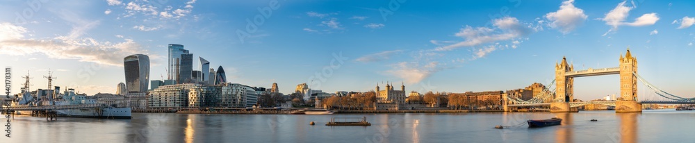 Long exposure panorama of Tower Bridge and financial district in London. England