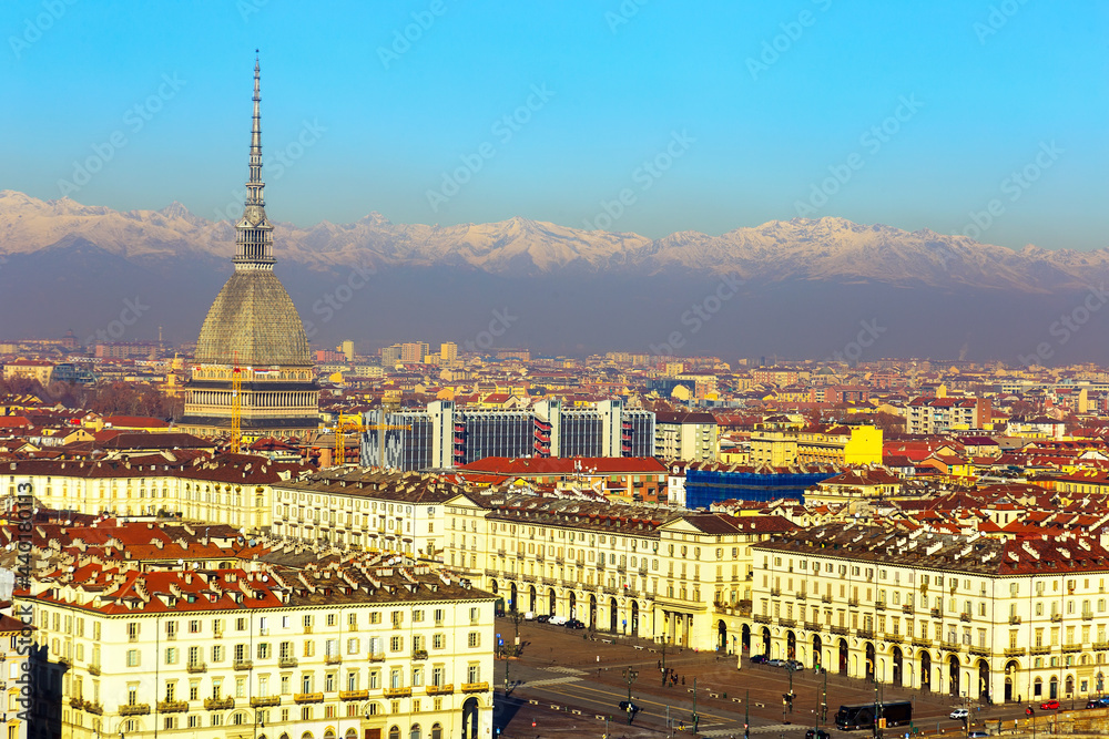 Scenic view of city center of Turin with Mole Antonelliana in sunny winter day, Italy.