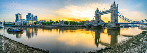 Photography Sunrise panorama of Tower Bridge and financial district in London, England