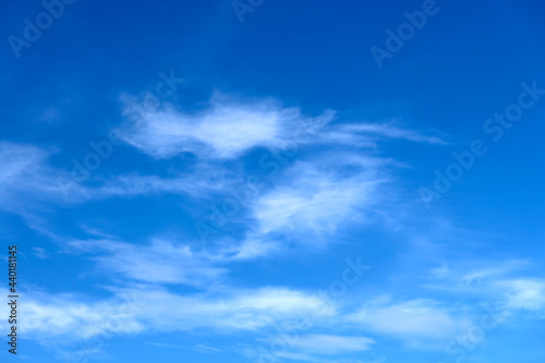 Blue sky with beautiful natural white clouds background