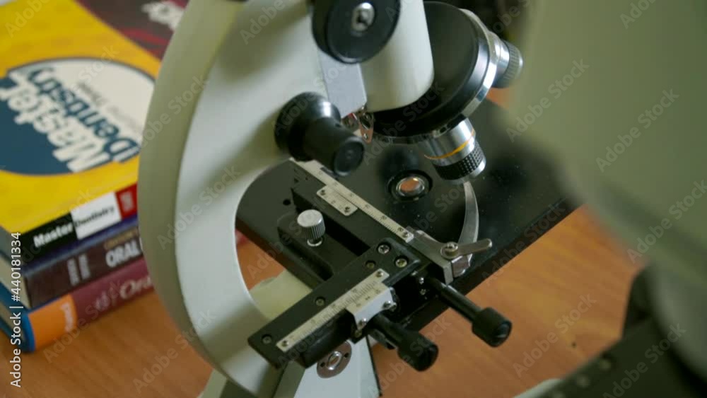 Closeup of Scientific microscope data analysis in the laboratory. Laboratory micro science medicine microscope research chemistry equipment scope biotechnology. Closeup of Scientific microscope data analysis in the laboratory. Laboratory micro science medicine microscope research chemistry equipment scope biotechnology.
