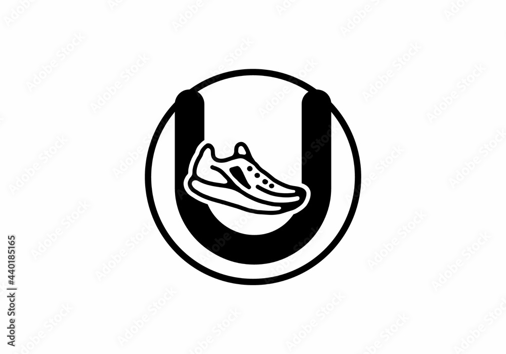 Black U initial letter with shoes in circle Black U initial letter with shoes in circle