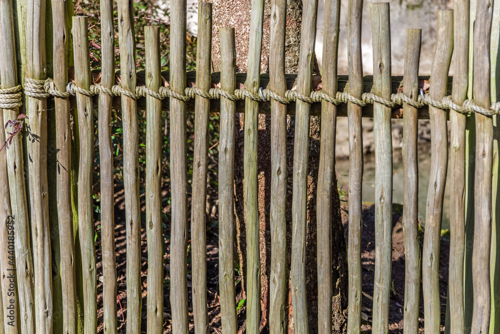 Wooden fence with woven rope Wooden fence with woven rope