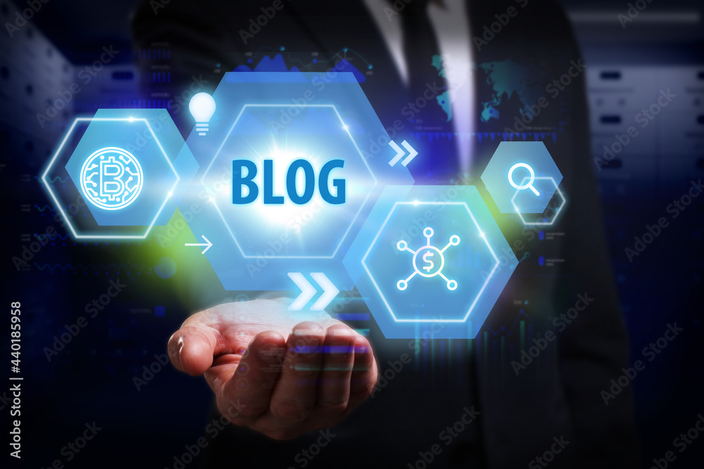 Business, Technology, Internet and network concept. Young businessman working on a virtual screen of the future and sees the inscription: Blog Business, Technology, Internet and network concept. Young businessman working on a virtual screen of the future and sees the inscription: Blog
