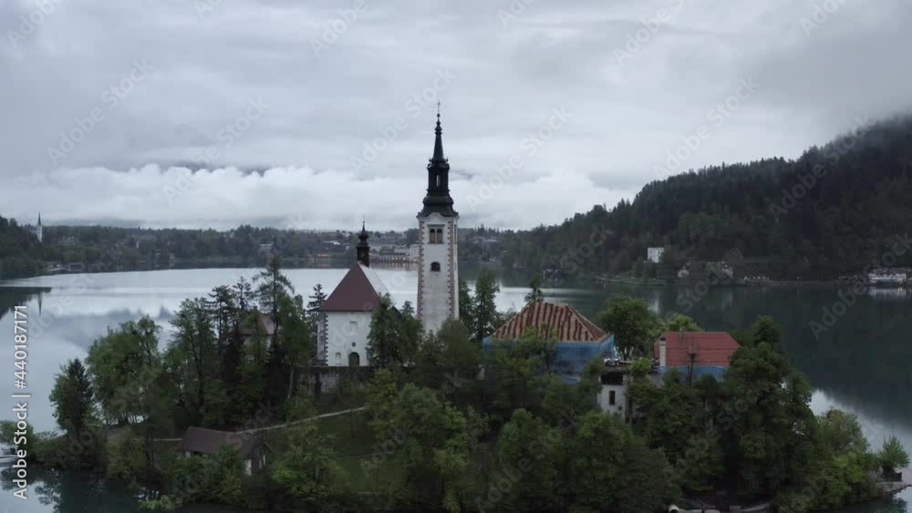 Aerial view Bled lake Church, Slovenia
Pilgrimage Church of the Assumption of Maria (Bled Island) on a Cloudy day,2021
Aerial view Bled lake Church, Slovenia
Pilgrimage Church of the Assumption of Maria (Bled Island) on a Cloudy day,2021