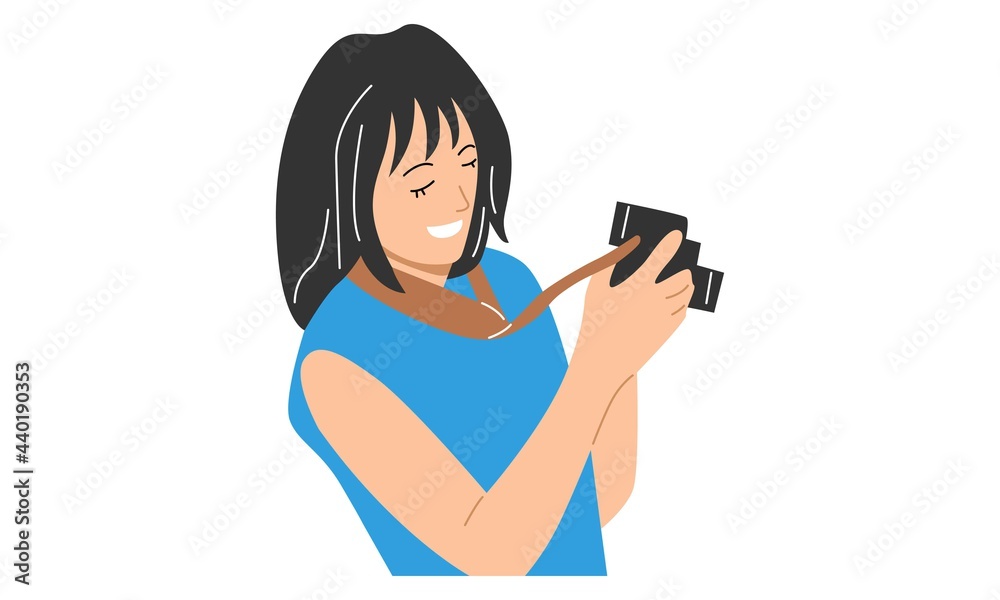 Woman holding a digital camera Woman holding a digital camera