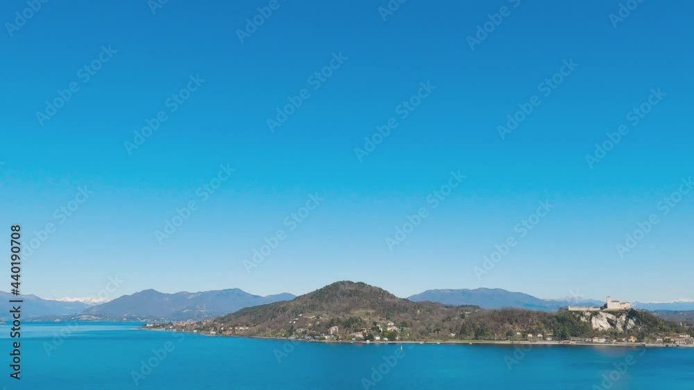 Stunning view of Angera perched castle overlooking Lake Maggiore in Italy Stunning view of Angera perched castle overlooking Lake Maggiore in Italy