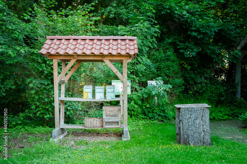 BUNDE  GERMANY. JUNE 12  2021. Small advertizing alcove at the entrance of apiary