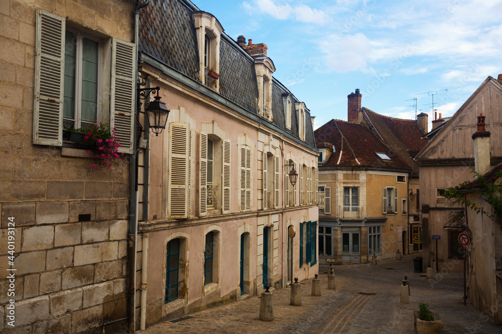 Traditional architecture of Auxerre old narrow streets, France..