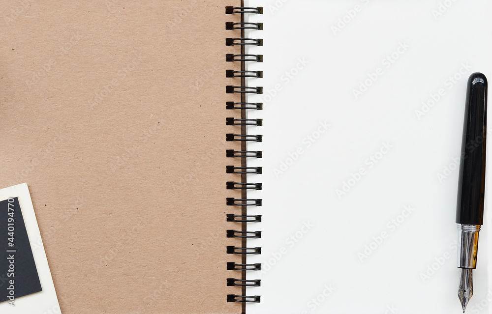 close up of notebook with pen for background close up of notebook with pen for background