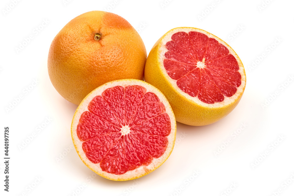 Juicy grapefruit with a half, isolated on white background. High resolution image. Juicy grapefruit with a half, isolated on white background. High resolution image.