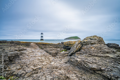 Penmon Lighthouse in the sea, North Wales. UK photo