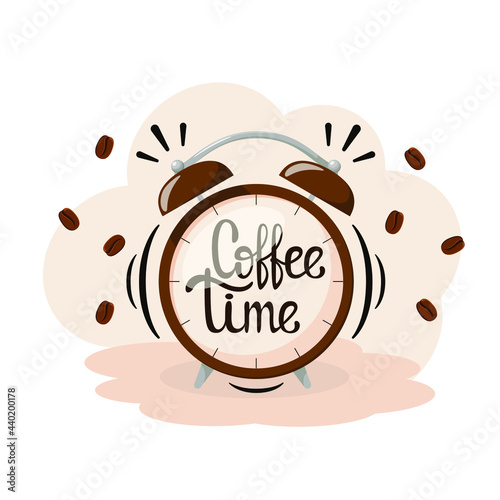 Coffee time. The inscription on the clock. Coffee beans.