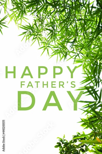 Greeting card with texts ‘Happy Father’s Day’ designed with leaves background, concept for giving greeting card in Father’s Day in June around the world. Selective focus on texts.