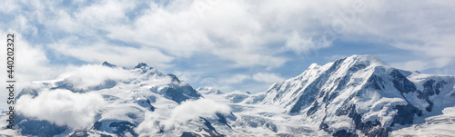 Panorama of cloud layer from mountain top over Swiss alps © Angelov