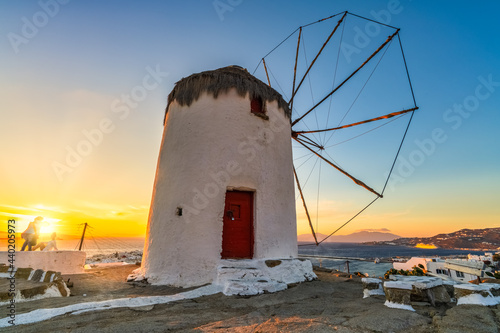 Famous windmill of Mykonos island at sunset