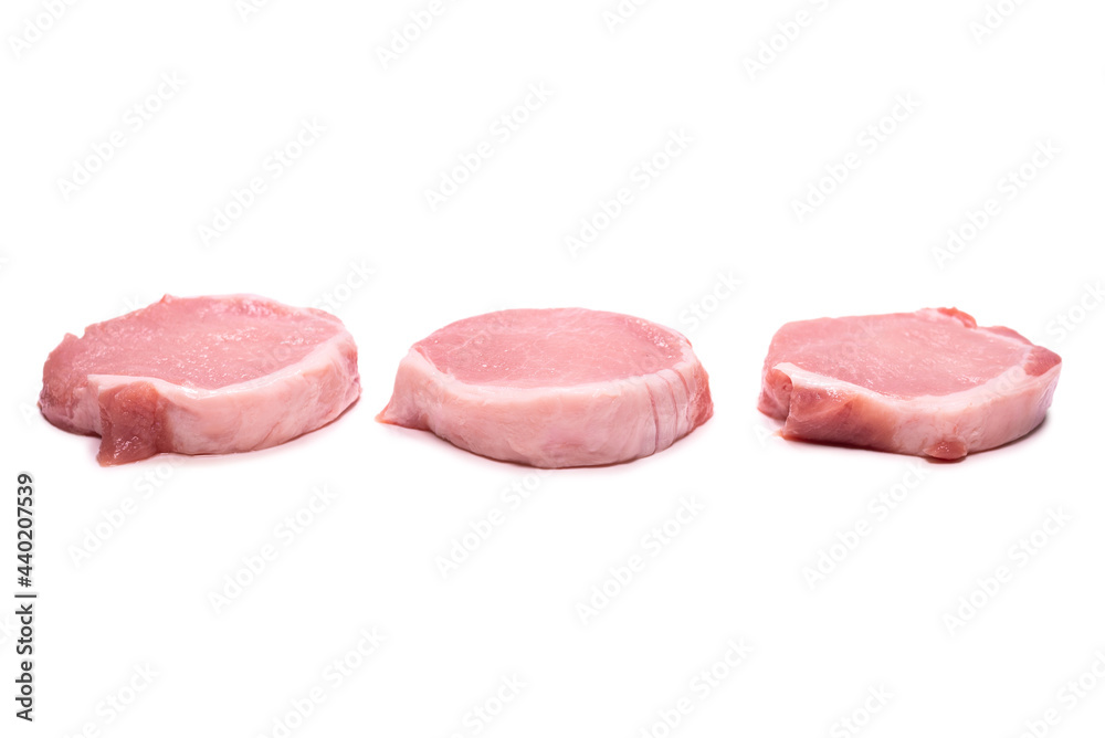 Raw pork pieces isolated on a white background. Raw pork pieces isolated on a white background.