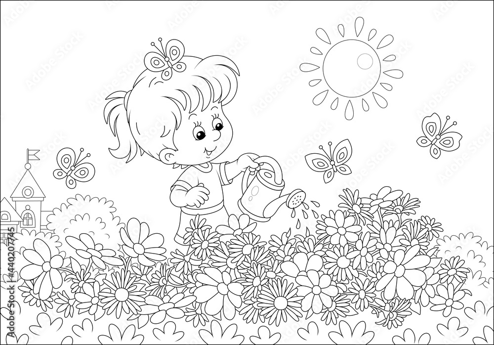 Happy little girl watering beautiful garden flowers on a pretty small
