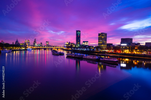 Southbank of river Thames at sunrise in London . England