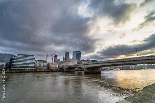 London bridge near south bank district with cloudy morning sky © Pawel Pajor
