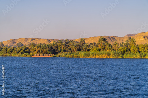 Horizontal panorama view of the shores of the Nile River in southern Egypt near Edfu