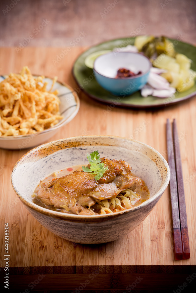 Khao Soi Kai, Northern Style Egg Noodle in Chicken Curry With Ingredients. Thai Food Khao Soi Kai, Northern Style Egg Noodle in Chicken Curry With Ingredients. Thai Food