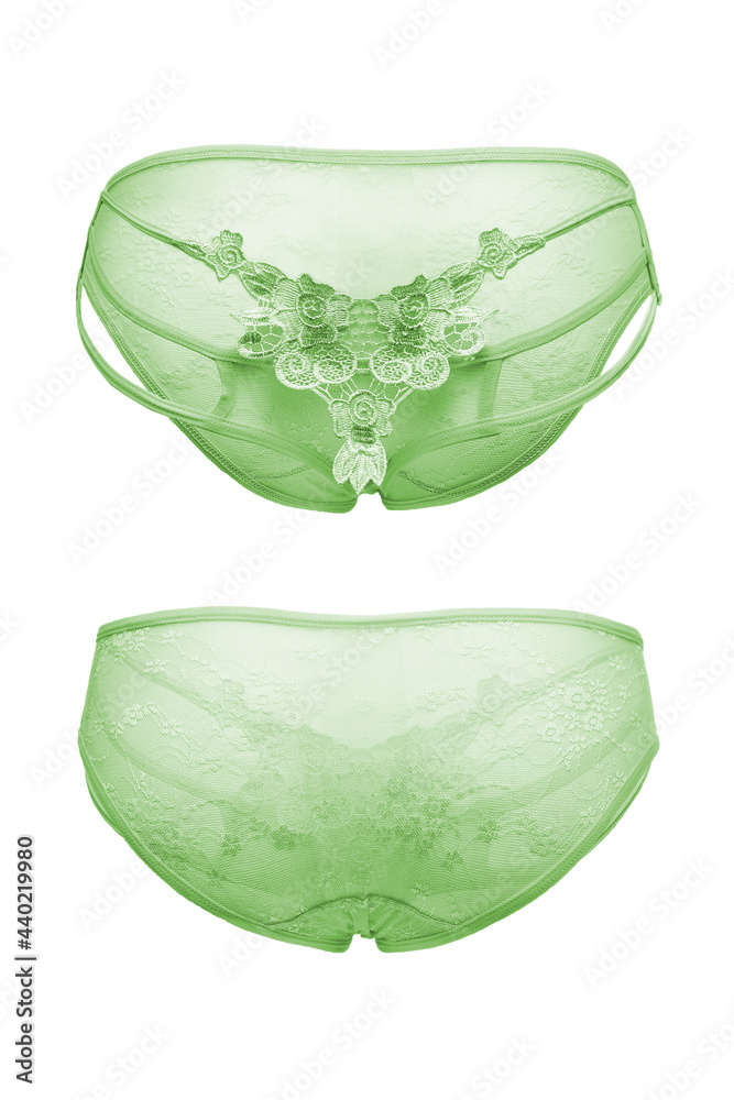 Naklejka premium Detail shot of green mesh panties with thin straps and fancy floral embroidery. Sexy lingerie is isolated on the white background. Front and back views. 