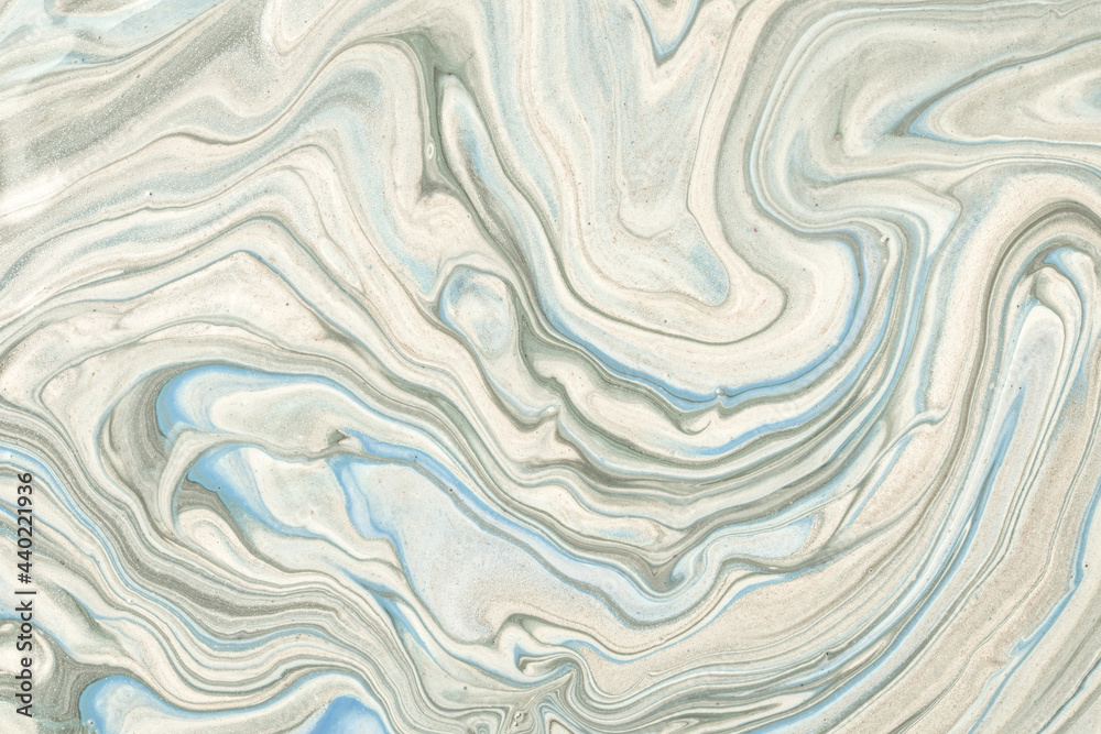 Abstract fluid art background light blue and gray colors. Liquid marble. Acrylic painting with ivory gradient. Abstract fluid art background light blue and gray colors. Liquid marble. Acrylic painting with ivory gradient.