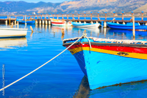 Colorful boat on water, in Aitoliko sea lake in Central Greece