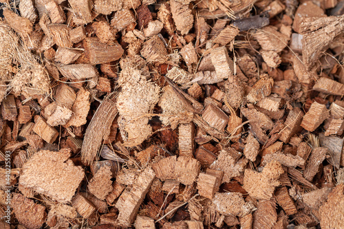 Fotografi background of coconut fiber husks used for potting soil mix for plants or terrar