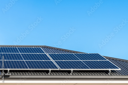 Wallpaper Mural Brand new solar panels on a house roof in Australia on a day against clear blue sky Torontodigital.ca