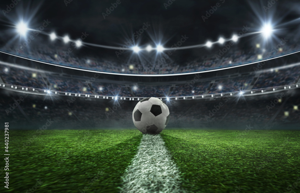Tradition soccer ball illuminated by stadium lights Stock Photo | Adobe ...