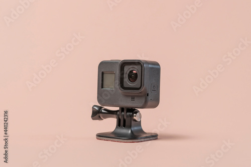 isolated black video action camera, adventure and sport mdeia equipment