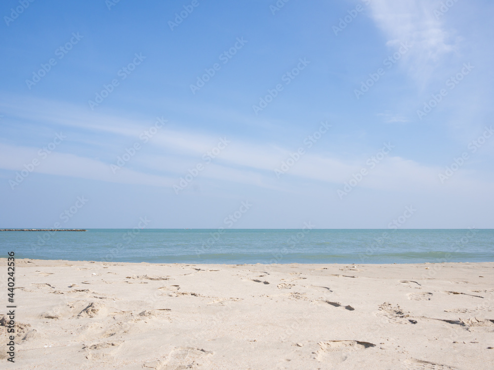 white sand beach and blue sky