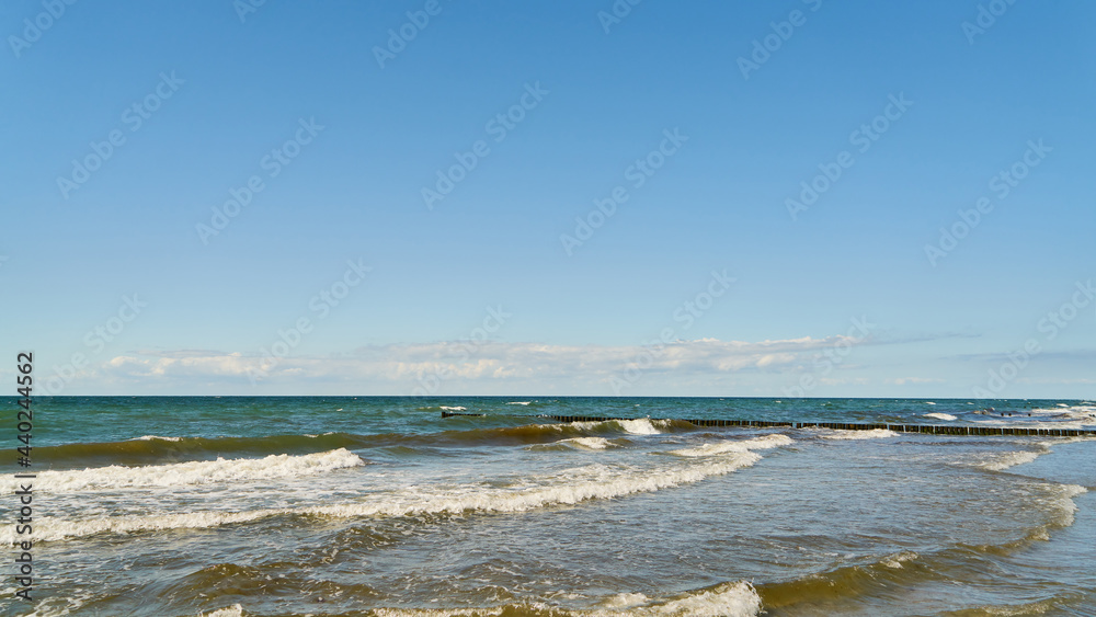 Blue sky and white clouds over sea with waves Stock Photo | Adobe Stock