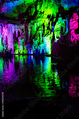 Nice cave formed by nature with stalactites, stalagmites, karst limestone © Pavel