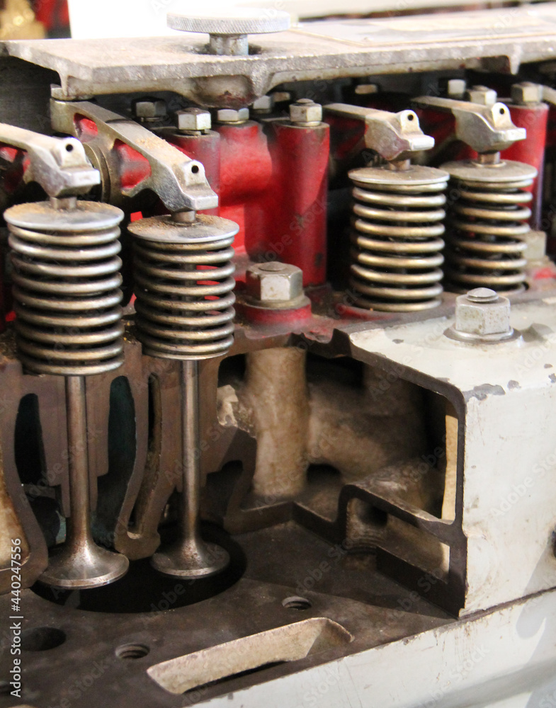 A Cutaway Display of the Head of a Petrol Car Engine. A Cutaway Display of the Head of a Petrol Car Engine.