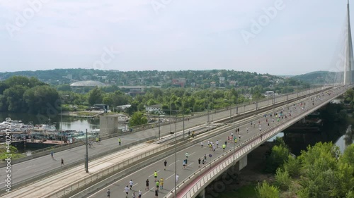 Aerial View Of Marathon Runners At Ada Bridge. Belgrade Marathon In Serbia. photo