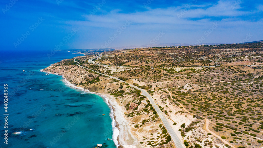 panoramic view of Cyprus road along coastline and small villages, aerial photography of popular tourist destination. clear sky