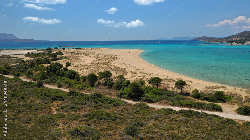 Aerial drone photo of beautiful exotic sandy seascape and beach of Pounta with beautiful clouds and deep blue sky close to famous Elafonisos island, Peloponnese, Lakonia, Greece