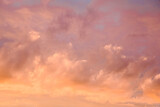 Orange sky at sunset. Yellow and pink clouds in the sky. Abstract background.