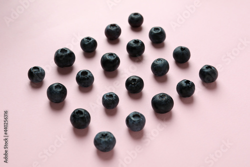 Fresh berry concept with blueberry on pink background