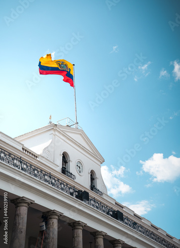 Scenic view of the Ecuadorian National flag on Carondelet Palace at Independence Square in Ecuador photo