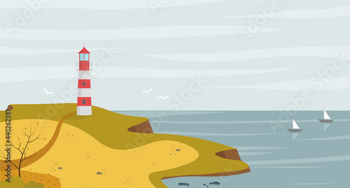 Lighthouse on seashore with sea view landscape in the autumn.