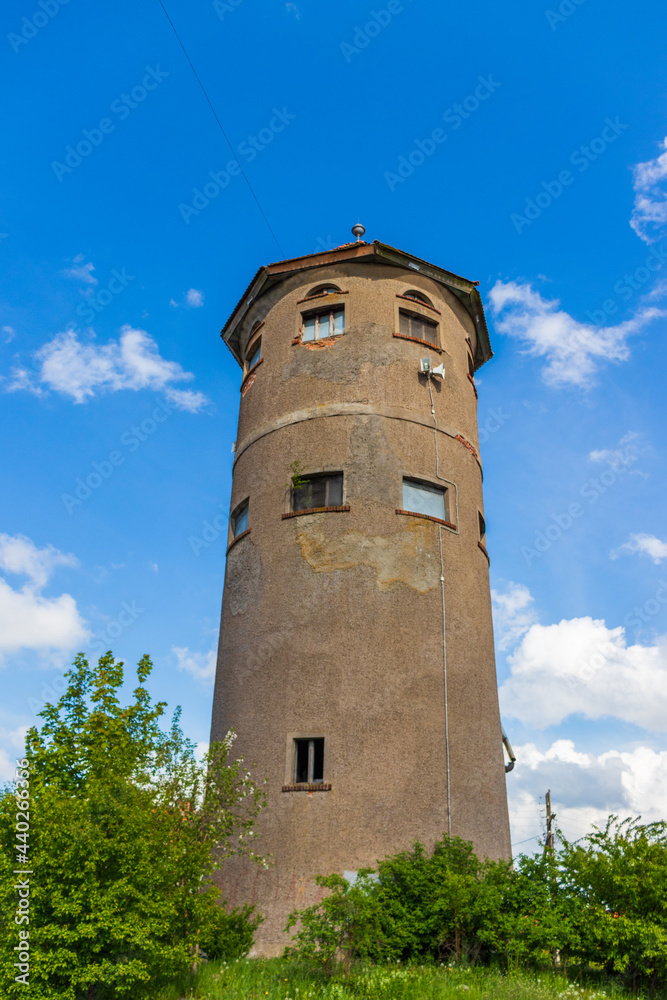 GVARDEYSK, KALININGRAD REGION, RUSSIA-MAY 20, 2021: City of Gvardeysk, urban landscape-Water tower GVARDEYSK, KALININGRAD REGION, RUSSIA-MAY 20, 2021: City of Gvardeysk, urban landscape-Water tower