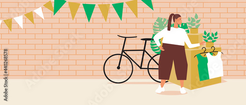 Buyer at a flea market, copy space template, flat vector stock illustration with a bike, fashion clothes at a second hand market
