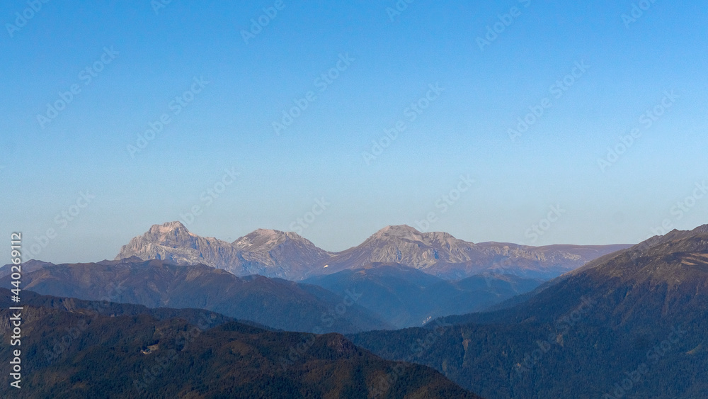daytime landscape in the Caucasian mountains against the blue sky